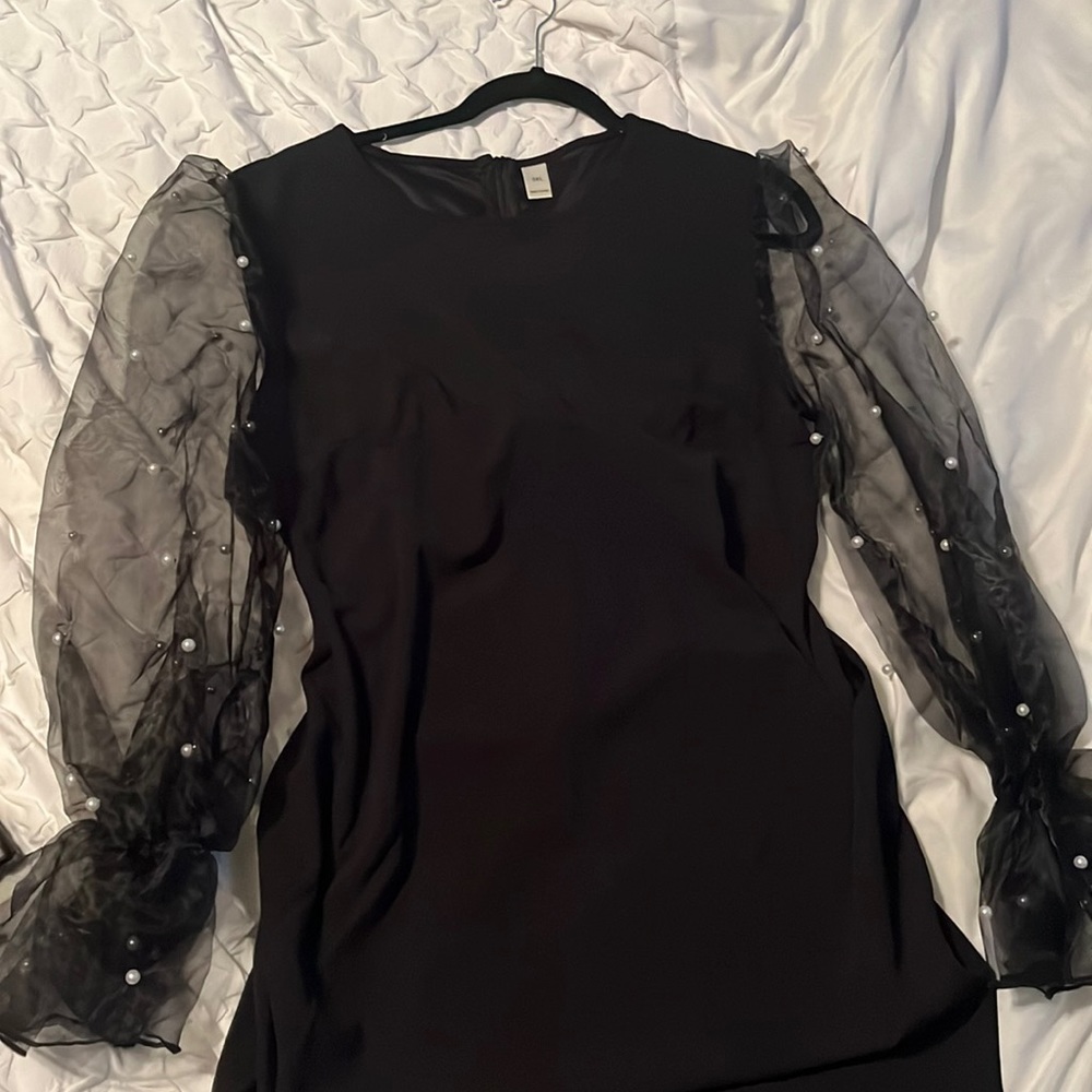 Black dress with pearl sleeves